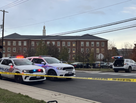 Gunfire exchanged outside of building, school placed on lockdown