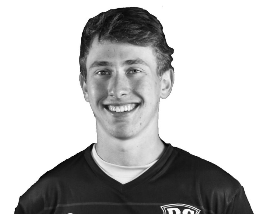 DC Current signs Wilson frisbee player
