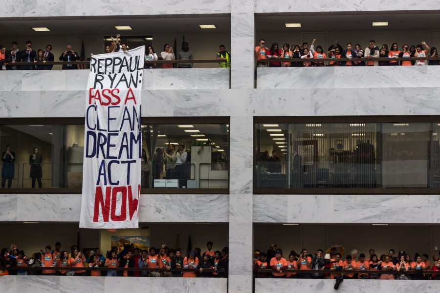 Demonstrators filled the lobby of the Hart Senate Building on Thursday to urge Congress to pass legislation protecting immigrant youth from deportation. 
