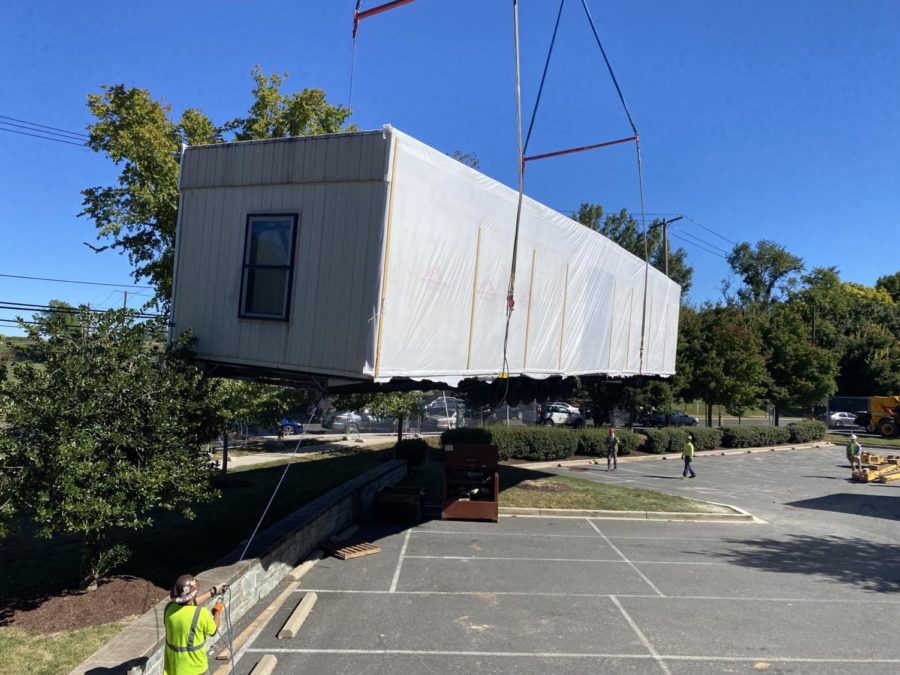TRAILER TIME - Portable classrooms dropped into the school parking lot. An overflow of students created a need for more space. 