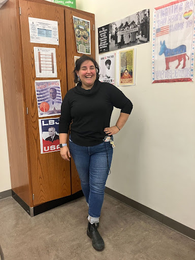 LIVELY DECOR FURTHERS CLASSROOM LEARNING - Social studies teacher Nicki Felmus stands proudly in front of her brightly decorated classroom. Be sure to check out the rest of her art gallery like classroom.