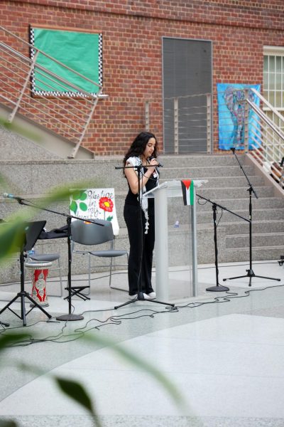 CULTURE NIGHT - Sophomore Yasmine Foty delivers the opening remarks at the ASU’s Palestinian Culture Night. Foty’s speech introduced the singing, dancing, and poetry readings that took place that evening.