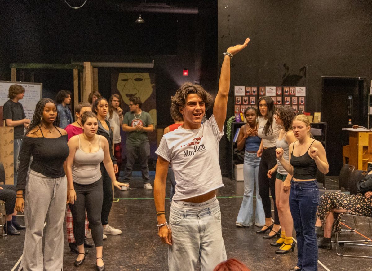 REHEARSING IN STYLE - Adrian Belmonte strikes a pose with the Kit Kat Girls. The cast rehearses the musical “Cabaret” that is set to go on in late May.