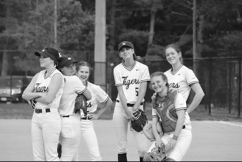 POWER+POSE-+Six+lady+tigers+pose+for+the+camera+in%0Atheir+softball+uniforms.+The+team+won+DCIAA+finals.